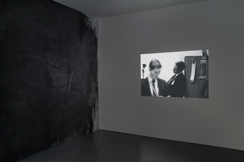 Fiona Banner in collaboration with Paolo Pellegrin and in association with the Archive of Modern Conflict. Mistah Kurtz – He Not Dead installation view at PEER, 2014. Photograph: FXP Photography.
