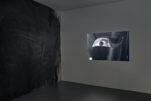 Fiona Banner in collaboration with Paolo Pellegrin and in association with the Archive of Modern Conflict. Mistah Kurtz – He Not Dead installation view at PEER, 2014 (2). Photograph: FXP Photography.