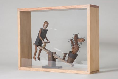 Andràs Böröcz. <em>See Saw</em>, 2006. Carved pencils, mixed media construction. 14 1/2 x 18 1/2 x 5 in. Courtesy Adam Baumgold Gallery.