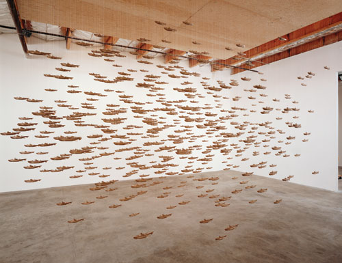 Chris Burden. All the Submarines of the United States of America, 1987. 625 miniature cardboard submarines, 96 x 240 x 144 in (243.8 x 609 x 365.2 cm). Dallas Museum of Art purchase with funds donated by the Jolesch Acquisition Fund, The 500 Inc., the National Endowment for the Arts, Bradbury Dyer, III, Mr. and Mrs. Bryant M. Hanley, Jr., Mr. and Mrs. Michael C. Mewhinney, Deedie and Rusty Rose, and Mr. and Mrs. William T. Solomon.