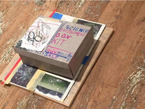 Susan Cianciolo. Science Experiment Box Kit, Science Box, Box of God Kit, 2003-15. Cardboard, glitter, glue, sketchbook (2014-2015), collage (2003), 6 x 14.5 x 19 in (15.24 x 36.83 x 48.26 cm). Unique. Photograph: Harry Hughes.