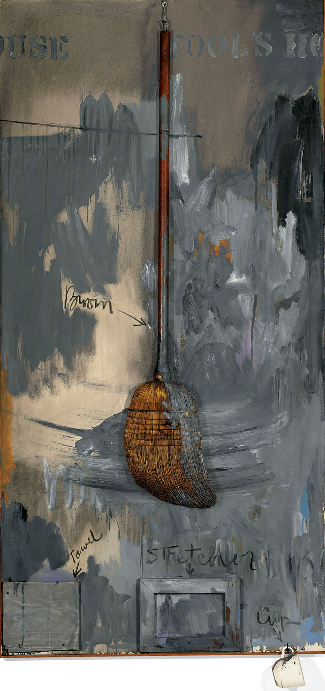 Jasper Johns, Fool’s House, 1961–62. Oil on canvas with broom, sculptural towel, stretcher and cup, 182.9 x 92.5 x 11.4 cm. Private collection © Jasper Johns / VAGA, New York / DACS, London 2017.