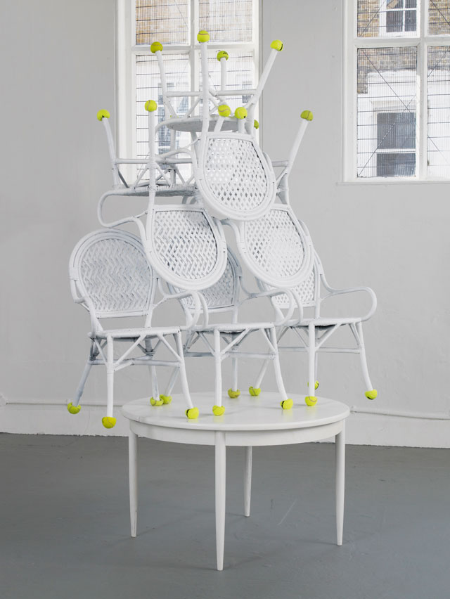 Jamian Juliano-Villani. Possession (Airbnb Poltergeist), 2016. Wicker chairs, teak table, emulsion, tennis balls, 179 x 269 x 122 cm. Courtesy of the artist and Tanya Leighton Gallery, Berlin. Photograph: Andy Keate.