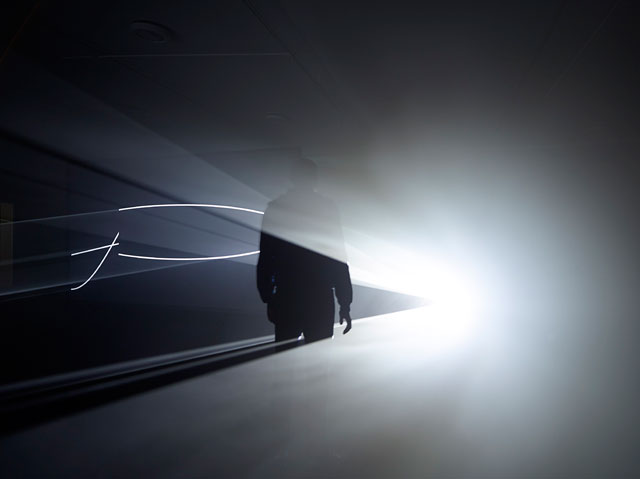 Anthony McCall. Face to Face II, 2013. Installation view, Eye Film Museum, Amsterdam 2014. Photograph: Hans Wilschut.