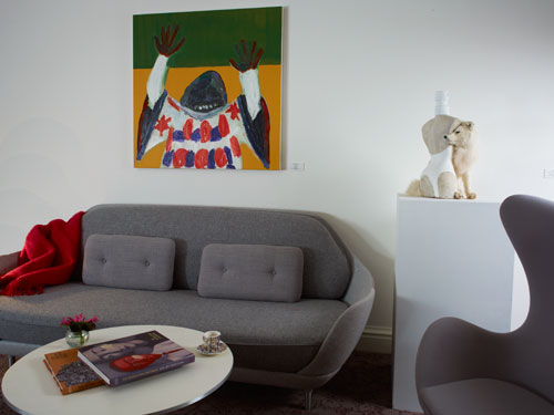 Clockwise from centre: Sofa by Jaime Hayon, oil painting by Carla Busuttil and  'Jean-PaulGaultier-Classique (ArticFox)' by Steve Bishop.