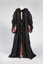Opera cloak worn by Lady Sassoon, c1895. Silk satin and taffeta with lace, 153 x 75 x 90 cm. Private Collection. Image © Houghton Hall.