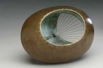 Barbara Hepworth, Sculpture with Colour and Strings, 1939. Bronze with light brown and light green patina and string. Barbara Hepworth © Bowness.