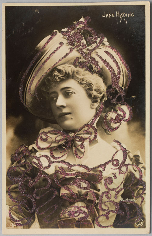 Reutlinger Studio (French, 1850-1937). Postcard of Jane Hading in La Pompadour, c1901. Hand-colored photograph with glitter. Private collection. Photograph: Bruce White.