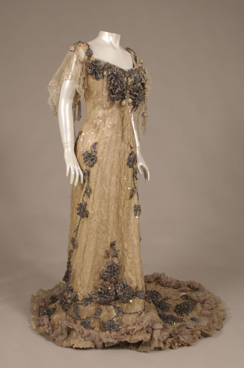 Charles Poynter (English, 1853–1929) for the House of Redfern (English, 1881–1929). Evening gown, c1904. Silk taffeta, silk satin, silk chiffon); lace; iridescent sequins and beads. Museum of the City of New York, Gift of Mrs. Ruth Fahnestock and Mrs. Faith Fahnestock Paine, 1941. Photograph: Bruce White.