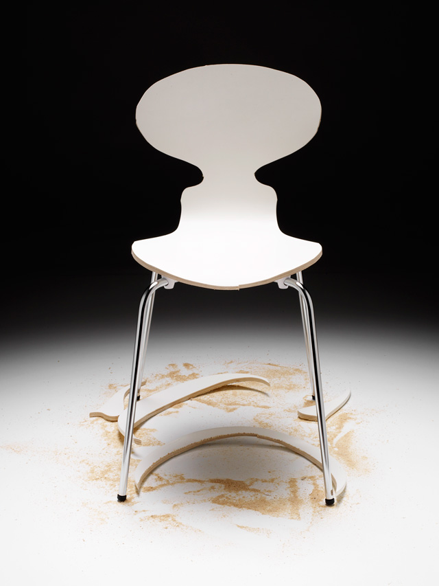 Superflex. Copy Right, 2006. White wooden chair, sawdust, wood cut-outs, white painted wooden platform, installation manual, 85 x 90 x 90 cm. Photograph: Egon Gade.