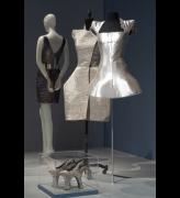 Dresses and shoes from the ARMOR section of the exhibition <em>Daphne Guinness</em> at The Museum at FIT. Photograph courtesy The Museum at FIT.