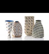A group of hand-built ceramic vessels with coloured slips by Elizabeth Fritsch. © The Artist. Image courtesy Adrian Sassoon, London. Photo: Sylvain Deleu.
