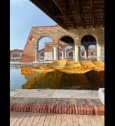 Serge Attukwei Clottey hung two structures made from plastic gallon bottles inside and outside the Arsenale. Photo: Veronica Simpson.