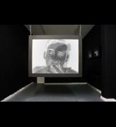 Toby Ross-Southall. Empirical Provocations, (Installation View), 2010. 144 slides, slide projectors, chain, rear projection PVC screen mounted in box frame, dimensions variable. © the artist.