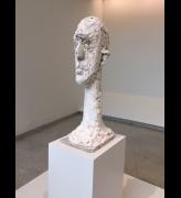 Alberto Giacometti. Monumental Head, 1960. Plaster, 39 9/16 x 12 1/2 x 16 15/16 inches (100.5 x 31.7 x 43.1 cm). Fondation Giacometti, Paris.