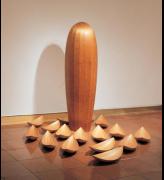 Donald Fortescue. <em>Self-Contained</em>, 2000-2001. Laminated and coopered mahogany with pyrographed markings, Laminated and coopered mahogany (Pod): 80 x 23 x 23in. (203.2 x 58.4 x 58.4cm) (Hulls): 5 1/2 x 27 x 9 1/2in. (14 x 68.6 x 24.1cm) each. Overall: Variable Dimensions. Museum of Arts & Design, New York. Museum purchase with funds provided by Simon Blattner, Marcia Docter, The Horace W. Goldsmith Foundation and The Wornick Family Foundation, 2005. Photo credit: Jeff Sturges, 2006.