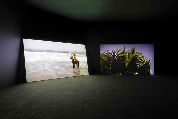 Karimah Ashadu, Cowboy, 2022. HD digital film, colour with sound, two channel, 10:40 mins. Installation view, Camden Art Centre, 2025. Courtesy the artist, Fondazione In Between Art Film, Sadie Coles HQ, London and Camden Art Centre. Photo: Andrea Rossetti.