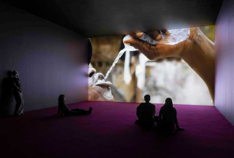 Karimah Ashadu, Muscle, 2025. HD digital film, colour with sound. single channel. Installation view, Camden Art Centre, 2025. Courtesy the artist, Fondazione In Between Art Film, Sadie Coles HQ, London and Camden Art Centre. Photo: Andrea Rossetti.