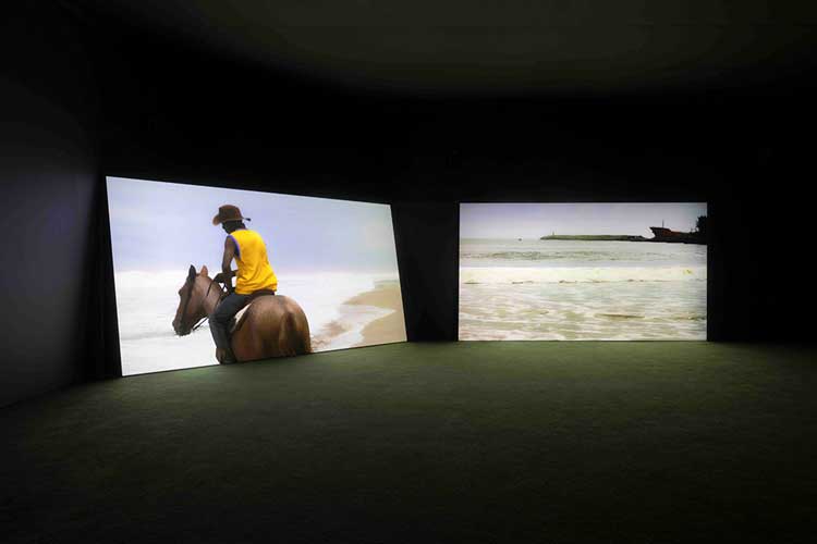 Karimah Ashadu, Cowboy, 2022. HD digital film, colour with sound, two channel, 10:40 mins. Installation view, Camden Art Centre, 2025. Courtesy the artist, Fondazione In Between Art Film, Sadie Coles HQ, London and Camden Art Centre. Photo: Andrea Rossetti.