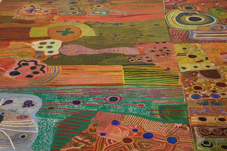 Foreground: Ngurrara Artists, Ngurrara Canvas II, 1997 (detail). Courtesy of the artists and the Ngurrara Canvas Management Group (NCMG) © Ngurrara Artists. Installation view, 25th Biennale of Sydney, Rememory, 2026, Art Gallery of New South Wales. Photo © Art Gallery of New South Wales, Felicity Jenkins.