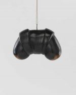 Louise Bourgeois, Hanging Janus, 1968, Bronze, dark and polished patina, 17.5 × 27.9 × 15.9 cm. The Easton Foundation, New York. © The Easton Foundation / VAGA at ARS, NY and DACS, London 2025. Photo: Christopher Burke.