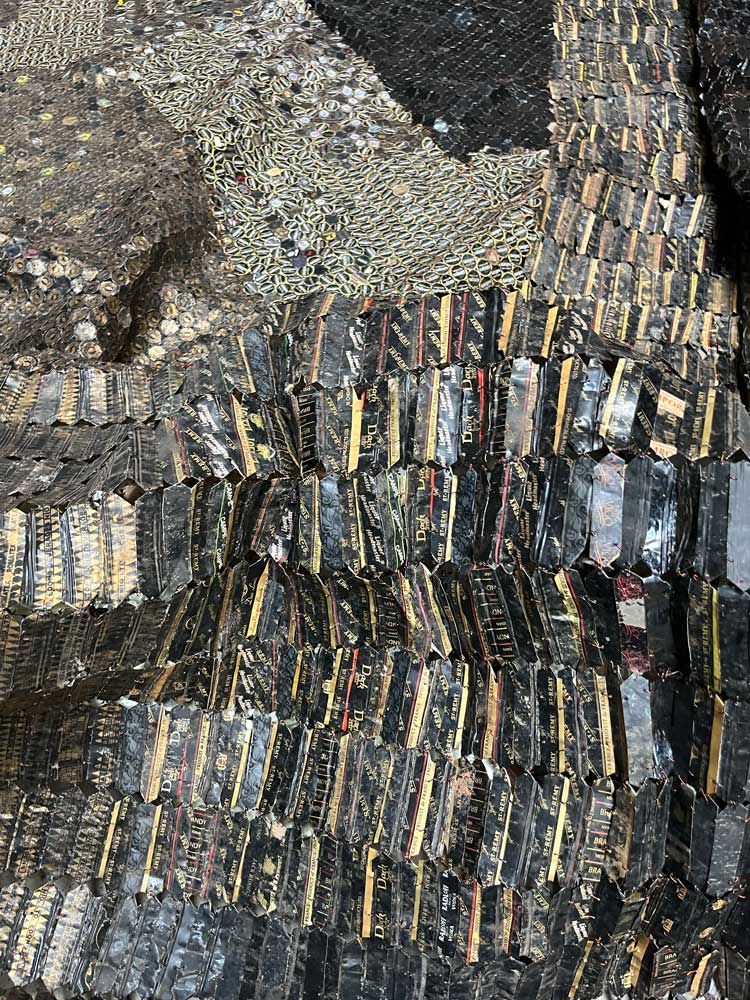 El Anatsui: Behind the Red Moon, installation view (detail), Hyundai Commission, Tate Modern, London, 2023. Photo: Veronica Simpson.