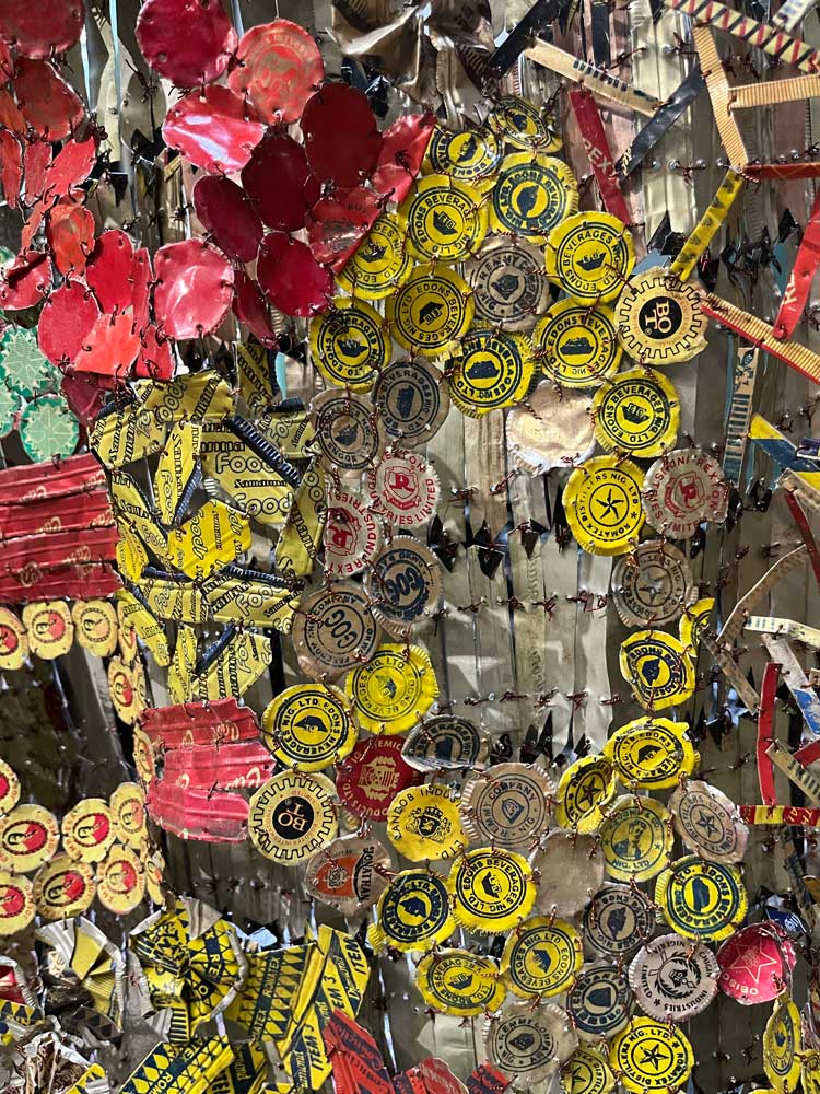 El Anatsui: Behind the Red Moon, installation view (detail), Hyundai Commission, Tate Modern, London, 2023. Photo: Veronica Simpson.