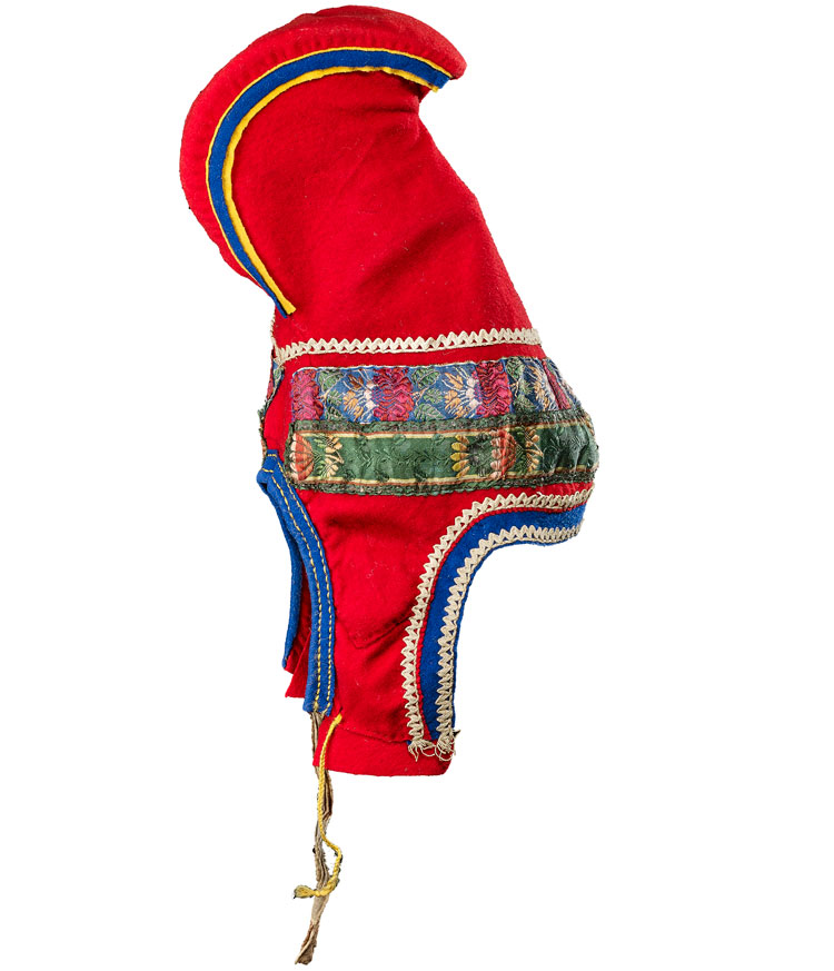 Woman’s hat or ládjogahpir, Sámi, Norway. Wool, horn, cotton and silk, pre-1919. © Trustees of the British Museum.