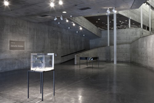 Zarouhie Abdalian. Each envelope as before, 2013. Acrylic vitrine, solenoids, electronics, and steel. 47 3/4 x 70 x 38 in. Installation view: Berkeley Art Museum, 2013. Courtesy the artist and Altman Siegel, San Francisco.