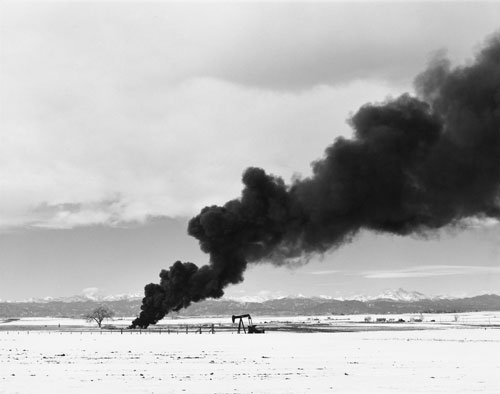 Robert Adams. Burning oil sludge, north of Denver, Colorado, 1973-74. 15 x 19 cm. Yale University Art Gallery. © Robert Adams. Courtesy Fraenkel Gallery, San Francisco and Matthew Marks Gallery, New York.