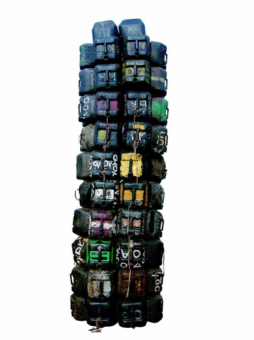 Romuald Hazoumé, Bidon Armé, 2004. Mixed media, photograph 380 x 110 x 110 cm. Courtesy of the artist © ADAGP, Paris and DACS, London 2005 (optional)