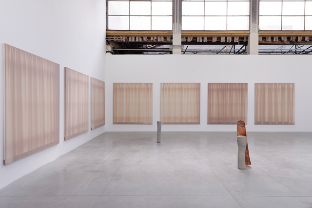 Stills, 2013-17 by Marie Lund (wall) and Attitudes, 2014 (concrete) and Vase, 2017 (copper). Exhibition view, Palais de Tokyo, Paris, 2017. Photograph: Aurélien Mole.