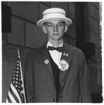 Diane Arbus. Boy with straw hat waiting to march in a pro-war parade, N.Y.C. 1967. Copyright © 1969 The Estate of Diane Arbus, LLC