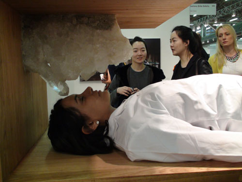 Marina Abramovic. <em>Bed for Human Use,</em> 2012. Reenacted, live performance. Luciana Brito Galeria. Photograph: Miguel Benavides.