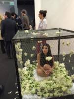 Romina de Novellis. Nude in a cage with roses, 2015. Photograph: Jill Spalding.