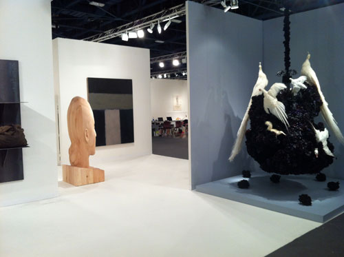 Installation view (2) of Galerie Lelong’s booth at Art Basel Miami Beach 2012. Works clockwise from left: Untitled (2002), Jannis Kounellis; Marianna H (2012), Jaume Plensa; Standing Grey (2001), Sean Scully; Untitled #1375 (No Reason Except Love) (2011-12), Petah Coyne. Courtesy Galerie Lelong, New York & Paris.