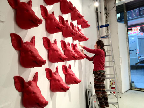 Current studio artist Seunghwei Koo prepares for her show at Chashama's 266 W 37th St gallery. Photograph courtesy of Chashama.