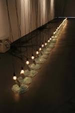 Suzann Victor. <em>Expense of Spirit in a Waste of Shame </em>2002. Light bulbs, mirrors, cables, mechanical rockers, control unit, broken glass.