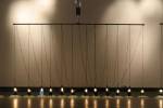 Suzann Victor. <em>Expense of Spirit in a Waste of Shame </em>2002. Light bulbs, mirrors, cables, mechanical rockers, control unit, broken glass.