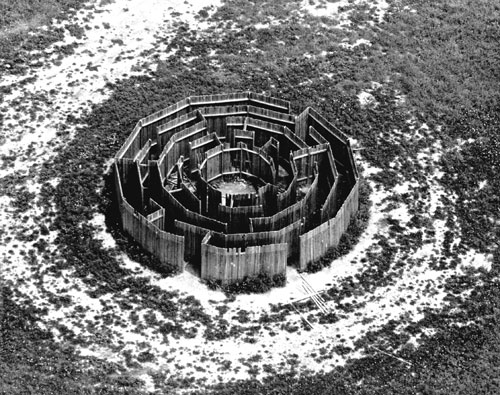 Alice Aycock. Maze, 192. 12-sided wooden structure of 5 concentric dodecagonal rings, broken by 19 points of entry and 17 barriers; 32 diameter x 6 ft h. Originally sited at Gibney Farm near New Kingston, Pennsylvania, (destroyed 1974)
Photo: Silver Spring Township Police Department, Mechanicsburg, PA.