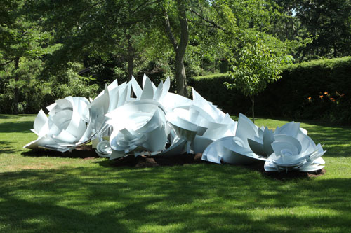 Alice Aycock. Maelstrom (Module 3), 2013. Painted aluminum; 6’ tall x 30’ wide x 30’ long. Edition of 2. The sculpture is part of the full scale Maelstrom. Temporary installation at LongHouse Reserve, East Hampton, NY, July-Oct. 2013.