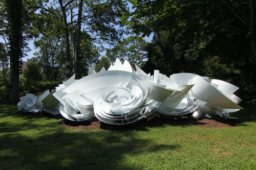 Alice Aycock. Maelstrom (Module 3), 2013. Painted aluminum; 6’ tall x 30’ wide x 30’ long. Edition of 2. The sculpture is part of the full scale Maelstrom. Temporary installation at LongHouse Reserve, East Hampton, NY, July-Oct. 2013. Courtesy Alice Aycock / PAPC & Galerie Thomas Schulte, Berlin. Photograph: Dave Rittinger.