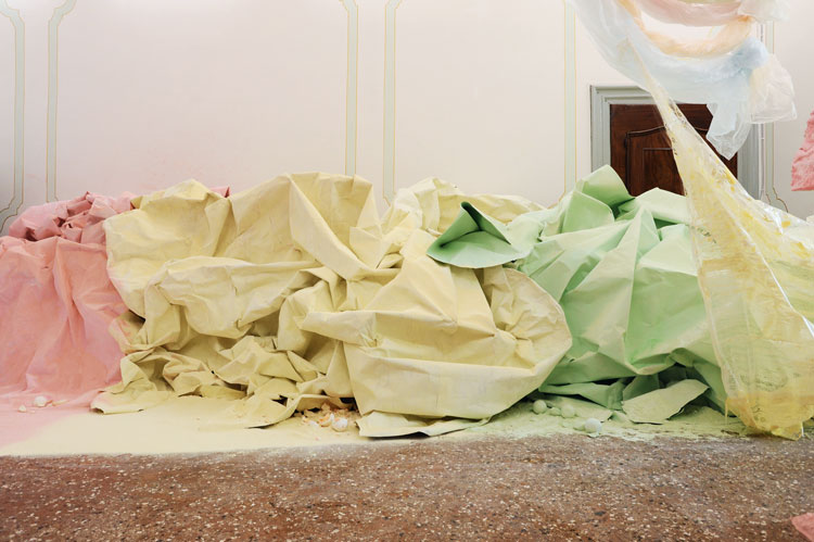 Karla Black At Fault (detail) 2011. Cellophane, paint, sellotape, plaster powder, powder paint, sugar paper, chalk, bath bombs, ribbon, wood. Installation view, Palazzo Pisani, Scotland + Venice, 2011. Courtesy the artist and Galerie Gisela Capitain, Cologne. Photo: Gautier Deblonde.