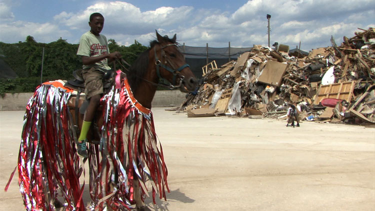 Mohamed Bourouissa, Horse Day, 2014–15. Two-channel video (colour, sound),13:32 minutes. Production MOBILES, with PMU support. © ADAGP, Paris 2018. Courtesy the artist and kamel mennour, Paris / London.