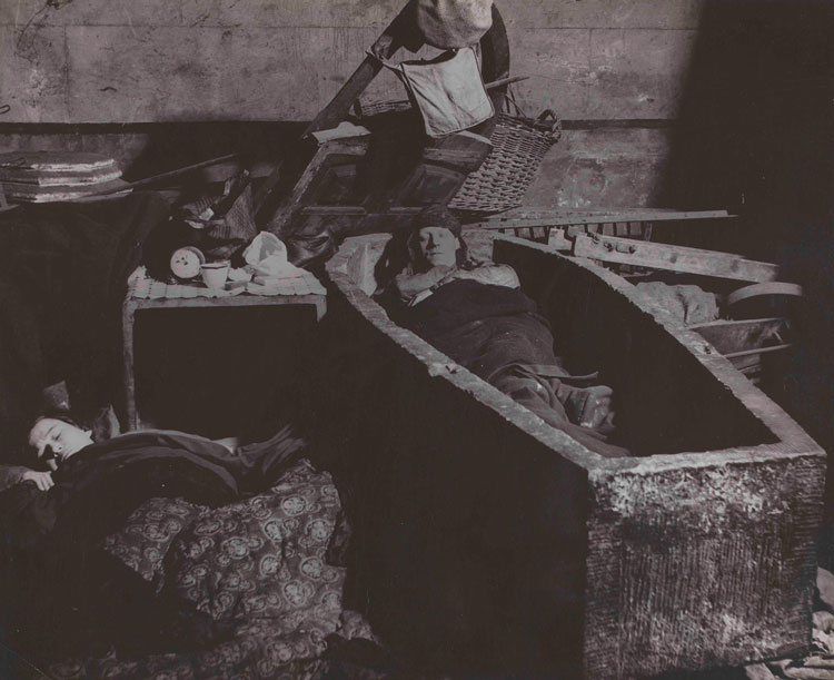 Bill Brandt, East End Crypt Shelter. Man Sleeping in a Coffin, 1940, gelatin silver print, Hyman Collection, London. © Bill Brandt/Bill Brandt Archive Ltd.