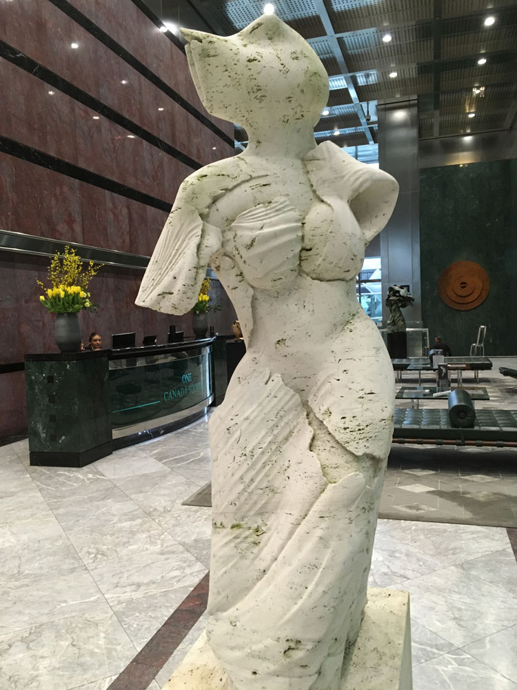 Helaine Blumenfeld, Venus, 1993. Travertine marble, 230 x 76 x 51 cm Installation view, One Canada Square. Photo: Veronica Simpson.