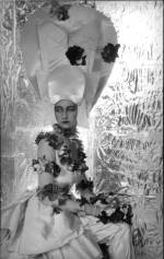 Maxine Freeman-Thomas dressed for Ascot in the year 2000 for the Dream of Fair Women Ball by Cecil Beaton, 1928. © The Cecil Beaton Studio Archive.
