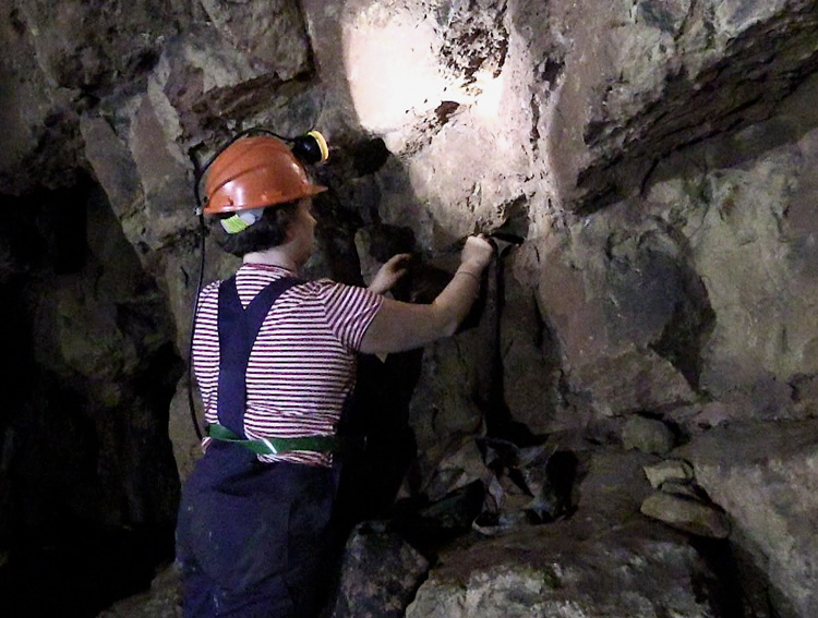 Installing Entirely Hollow Aside from the Dark, Creswell Crags Cave, Worksop, 2019. Photo: Martin Kennedy.