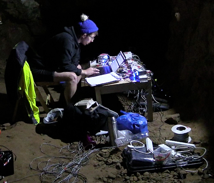 AlanJames Burns in his ‘office’, Creswell Crags Cave, Worksop, 2019. Photo: Martin Kennedy.