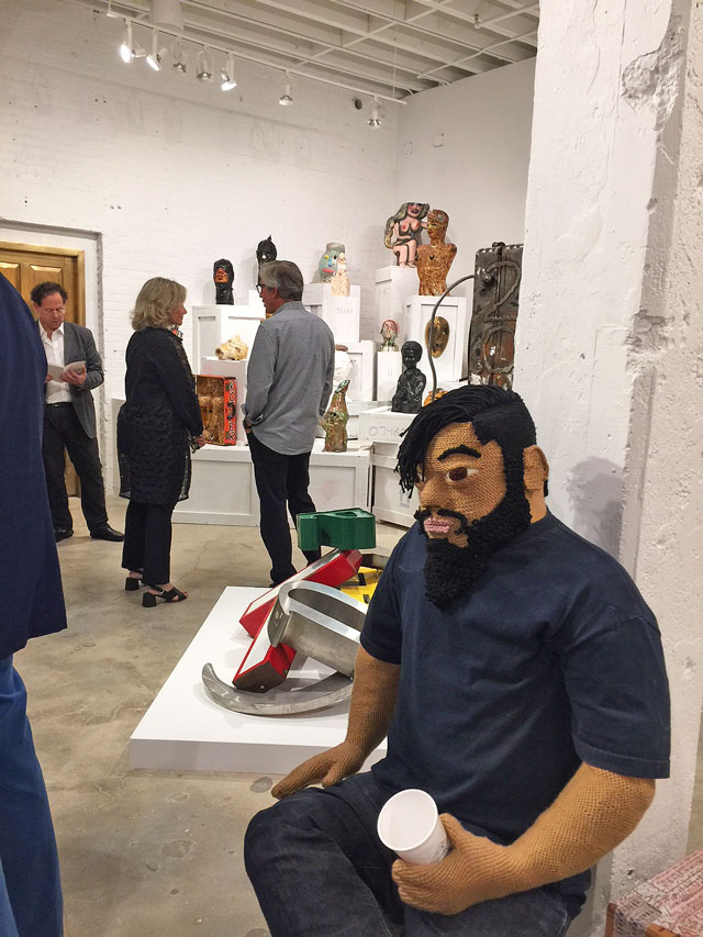 Luis Flores, Morning Coffee, 2017 (foreground). Installation view, The Bunker Artspace, West Palm Beach, Florida. Photo: Jill Spalding.